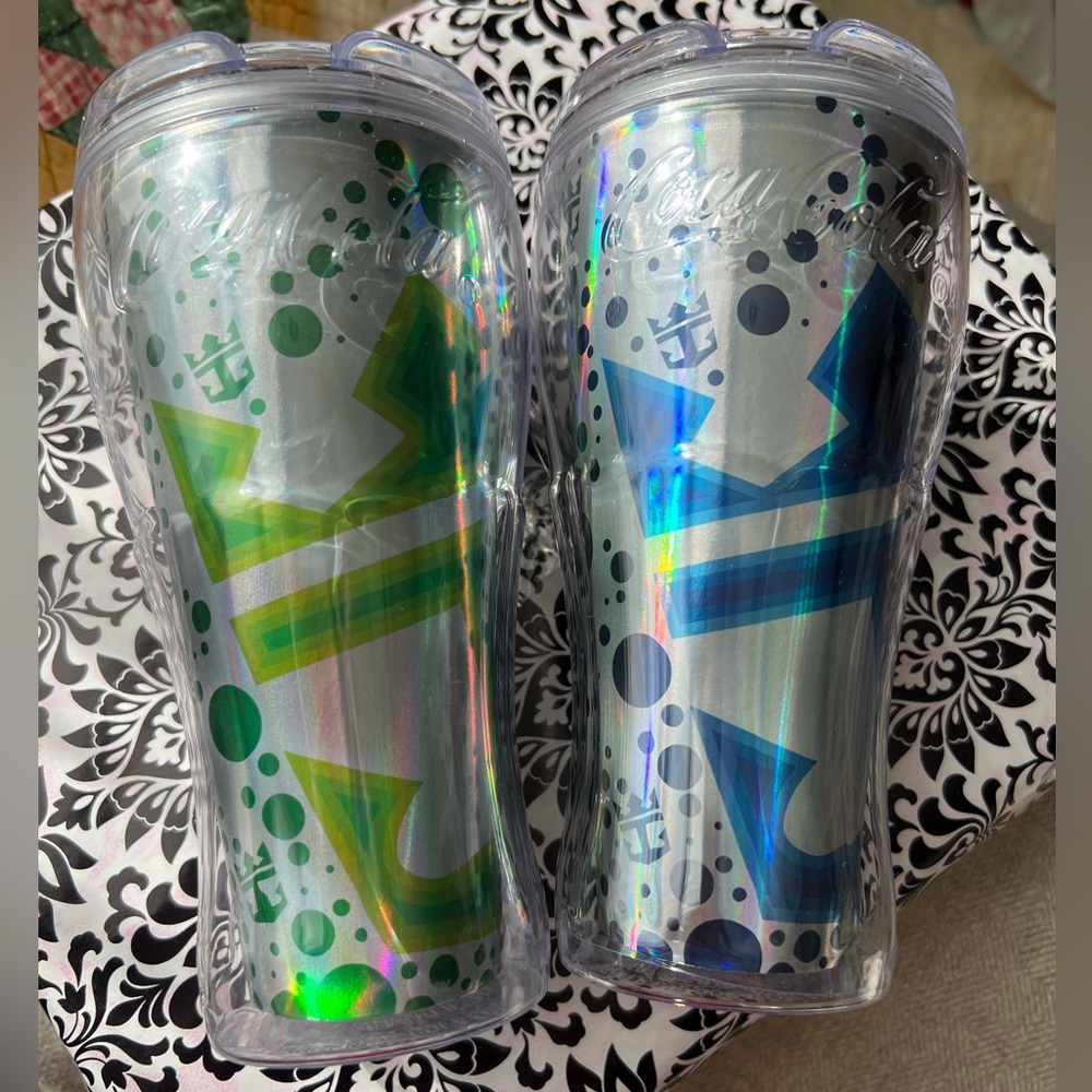 Set of two Royal Caribbean plastic Coca Cola collectible cups.  Blue and green.